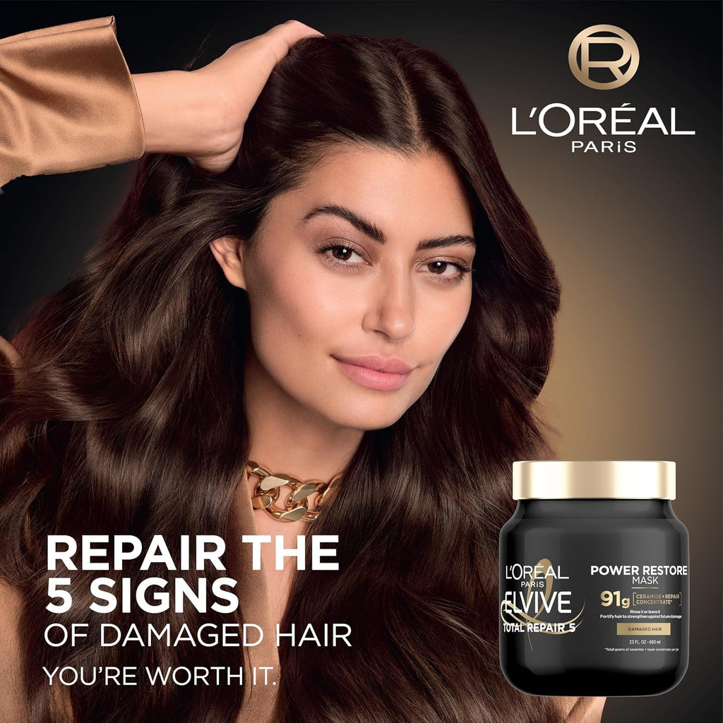 Femme aux cheveux brillants, masque Elvive Total Repair 5