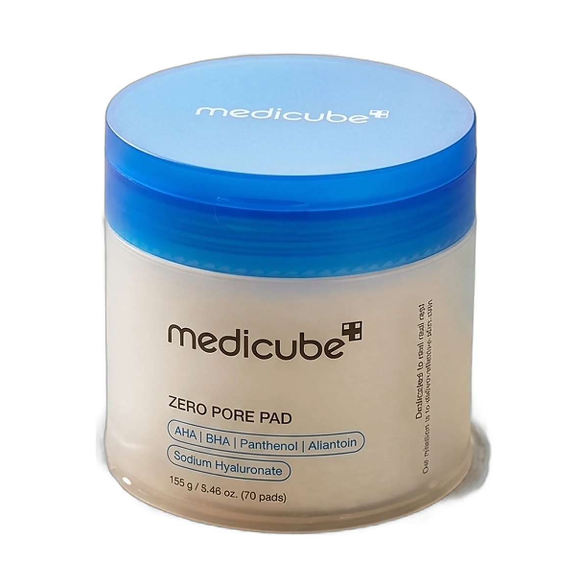 Pot de disques Medicube Zero Pore Pad mis en scène dans l'eau, disques flottants et ondulations