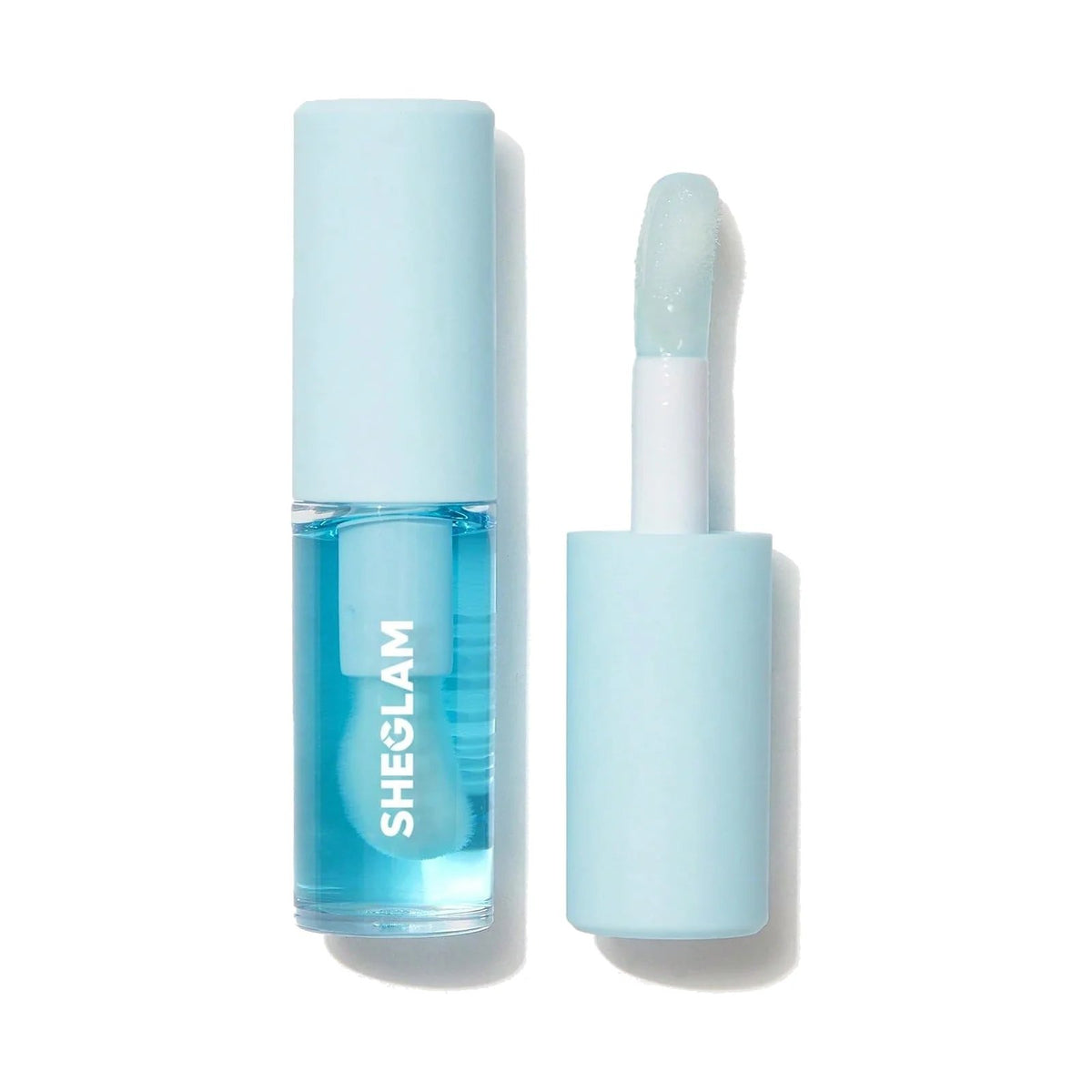 Huile à lèvres SHEGLAM Jelly Wow, teinte Mali-Blue Berry, sur fond blanc