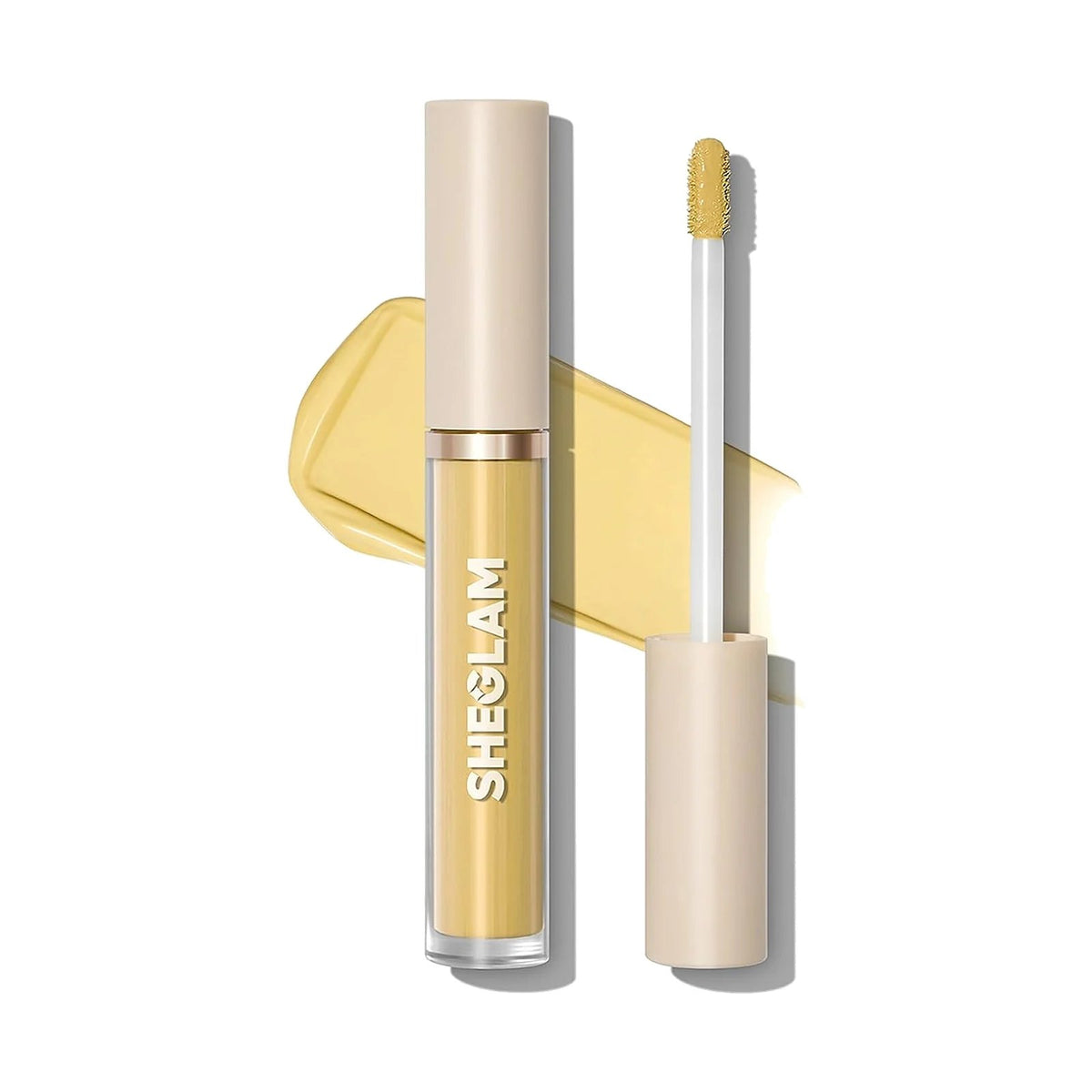 Anticernes SHEGLAM Like Magic 12 h, teinte Yellow, sur fond blanc