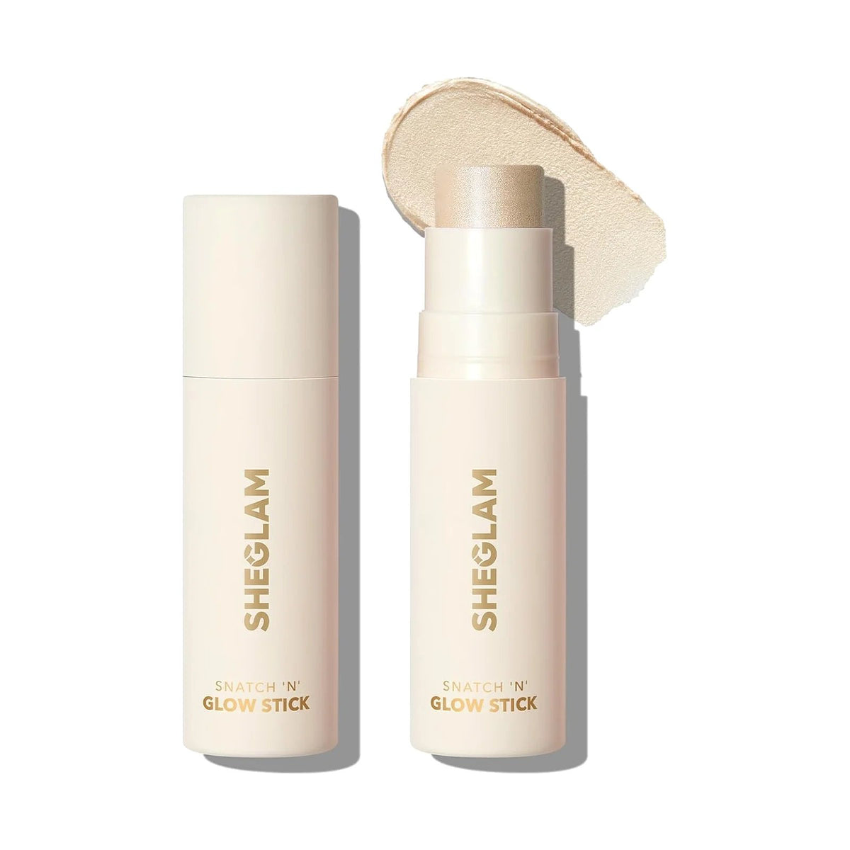 Highlighter stick SHEGLAM Snatch 'n' Glow, teinte Vanilla Frost, sur fond blanc
